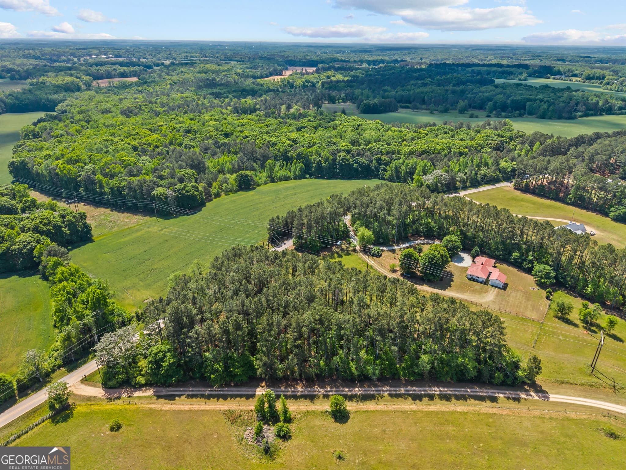 4 bedroom, 2.5 bathroom, 1,920 sq ft single family residence for sale at 1490 Crawley Road, Madison, GA 30650 — photo 4