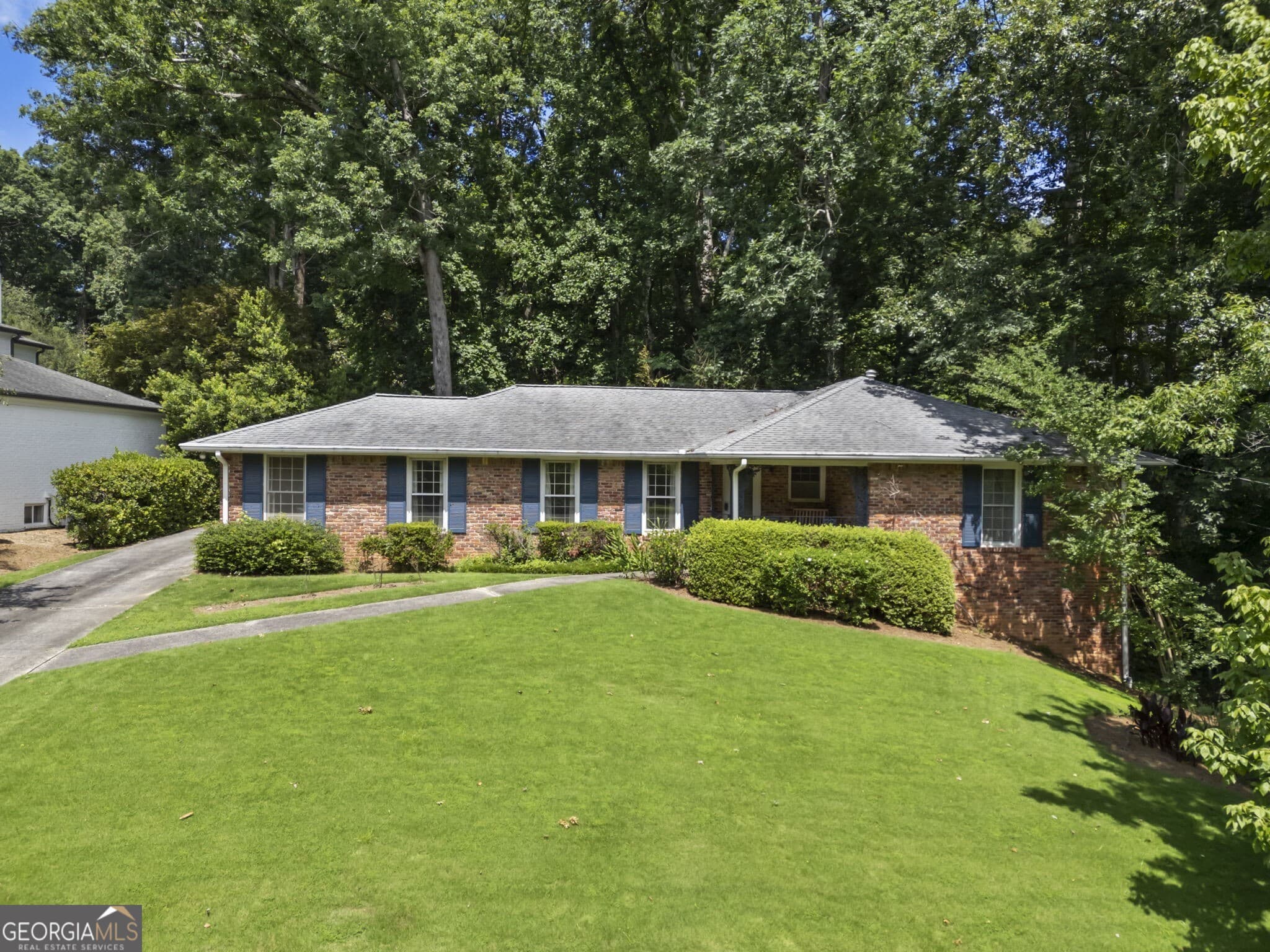 4 bedroom, 3 bathroom, 2,016 sq ft single family residence sold at 4870 Lansbury Drive, Sandy Springs, GA 30342
