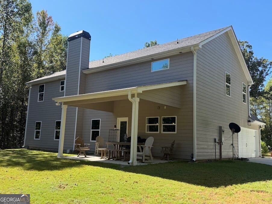 4 bedroom, 3 bathroom, 2,846 sq ft single family residence for sale at 2312 Crossroads Church Road, Buchanan, GA 30113 — photo 2