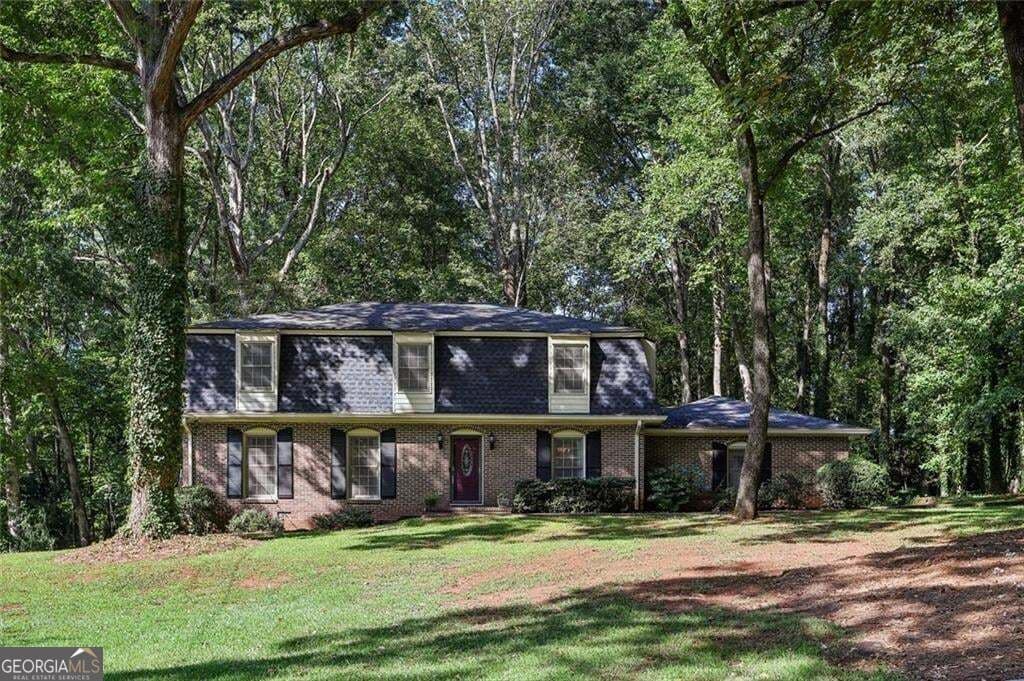 4 bedroom, 2.5 bathroom, 3,915 sq ft single family residence for sale at 4988 Mountclaire Road, Stone Mountain, GA 30087 — photo 3