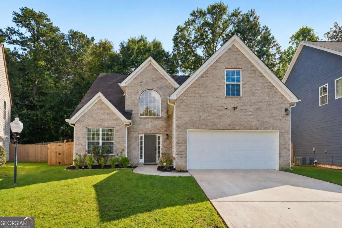4 bedroom, 2.5 bathroom, 2,354 sq ft single family residence for sale at 2765 Bench Circle, Ellenwood, GA 30294 — photo 2