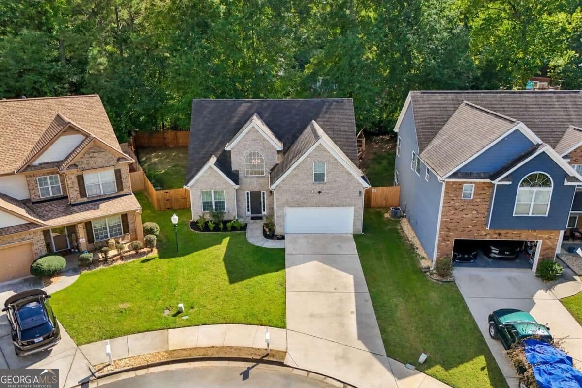 4 bedroom, 2.5 bathroom, 2,354 sq ft single family residence for sale at 2765 Bench Circle, Ellenwood, GA 30294 — photo 4