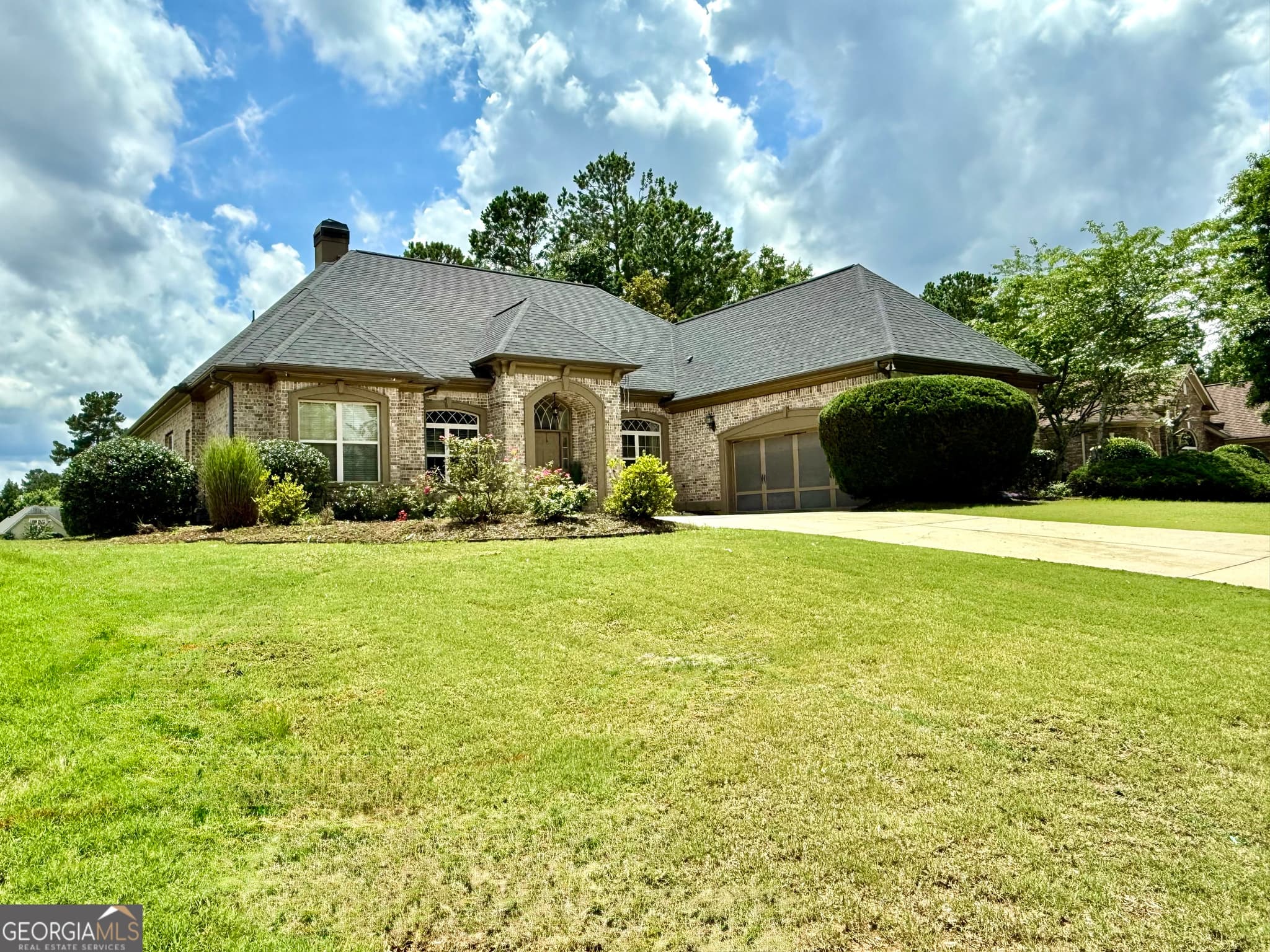4 bedroom, 3.5 bathroom, 3,185 sq ft single family residence for sale at 6409 Caledon Court, Locust Grove, GA 30248 — photo 2