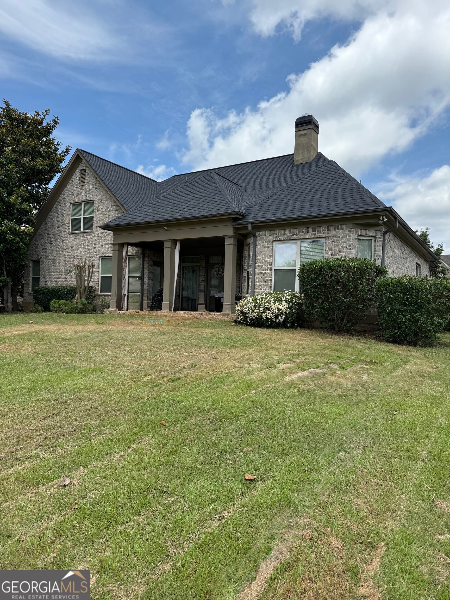 4 bedroom, 3.5 bathroom, 3,185 sq ft single family residence for sale at 6409 Caledon Court, Locust Grove, GA 30248 — photo 3