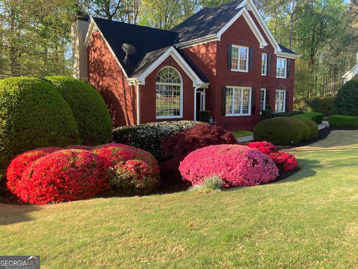5 bedroom, 3.5 bathroom, 3,720 sq ft single family residence sold at 4810 Hamptons Club Drive, Alpharetta, GA 30004