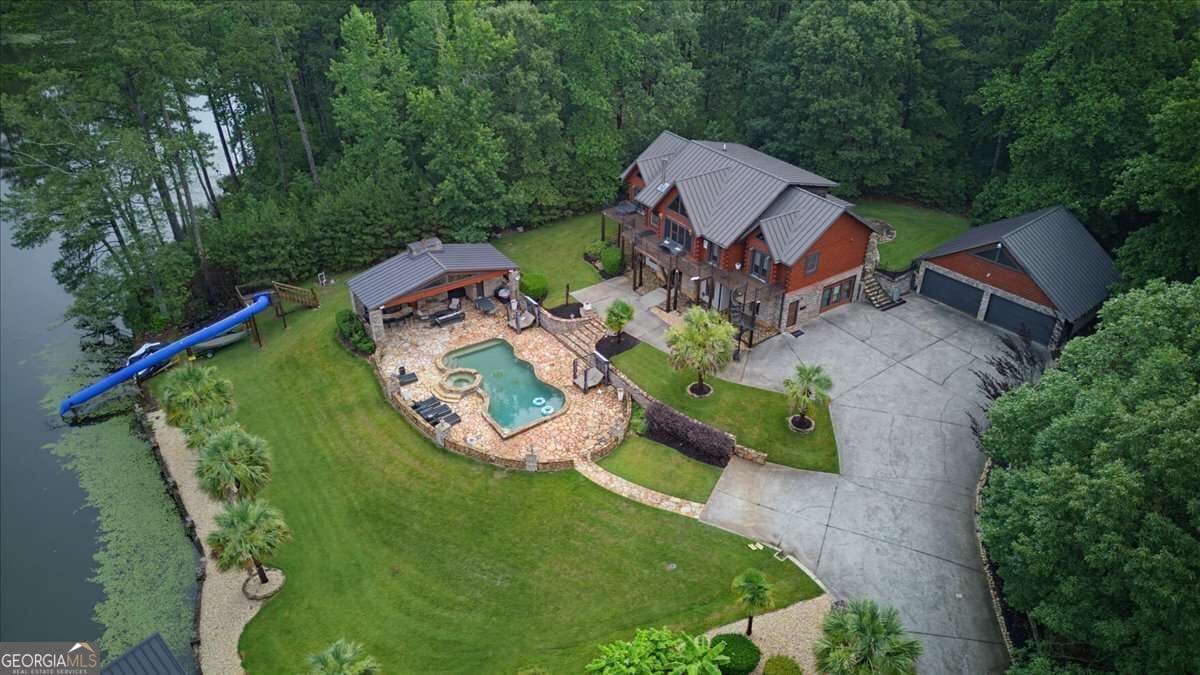 5 bedroom, 4.5 bathroom, 5,082 sq ft cabin,single family residence for sale at 4095 E Highway 166, Carrollton, GA 30116 — photo 6