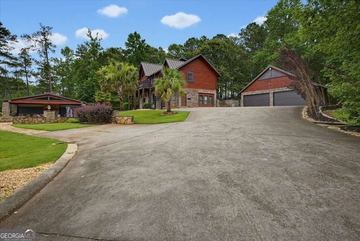 5 bedroom, 4.5 bathroom, 5,082 sq ft cabin,single family residence for sale at 4095 E Highway 166, Carrollton, GA 30116 — photo 7