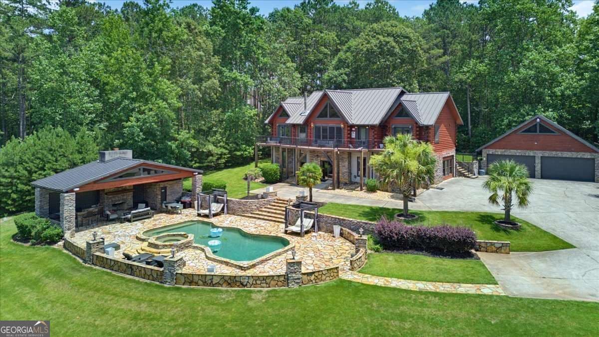 5 bedroom, 4.5 bathroom, 5,082 sq ft cabin,single family residence for sale at 4095 E Highway 166, Carrollton, GA 30116 — photo 3