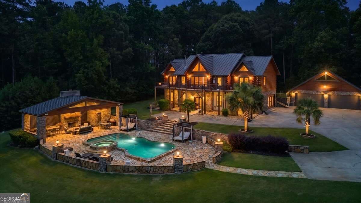 5 bedroom, 4.5 bathroom, 5,082 sq ft cabin,single family residence for sale at 4095 E Highway 166, Carrollton, GA 30116 — photo 1 of 78