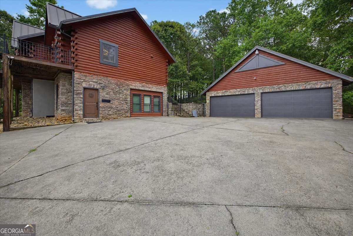 5 bedroom, 4.5 bathroom, 5,082 sq ft cabin,single family residence for sale at 4095 E Highway 166, Carrollton, GA 30116 — photo 9