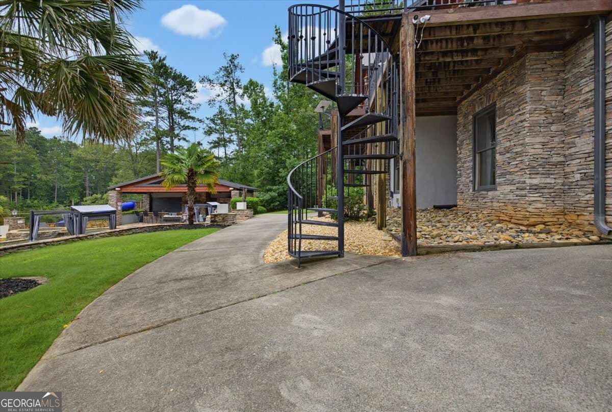 5 bedroom, 4.5 bathroom, 5,082 sq ft cabin,single family residence for sale at 4095 E Highway 166, Carrollton, GA 30116 — photo 10