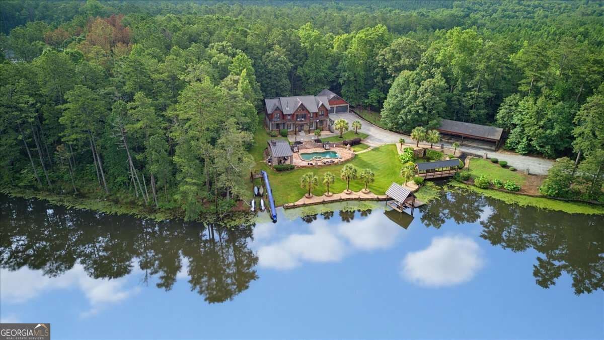 5 bedroom, 4.5 bathroom, 5,082 sq ft cabin,single family residence for sale at 4095 E Highway 166, Carrollton, GA 30116 — photo 4