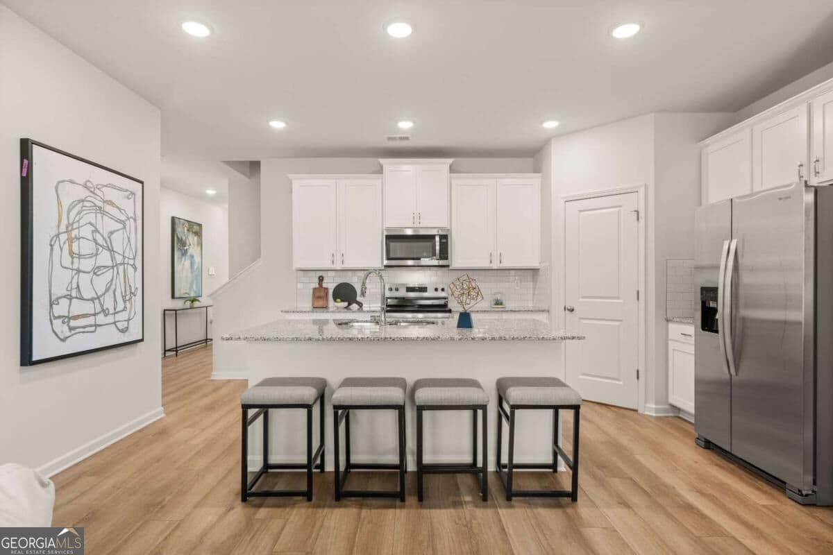 4 bedroom, 3.5 bathroom, 2,329 sq ft single family residence for sale at 1288 Harmony Ridge Court, Jonesboro, GA 30238 — photo 8