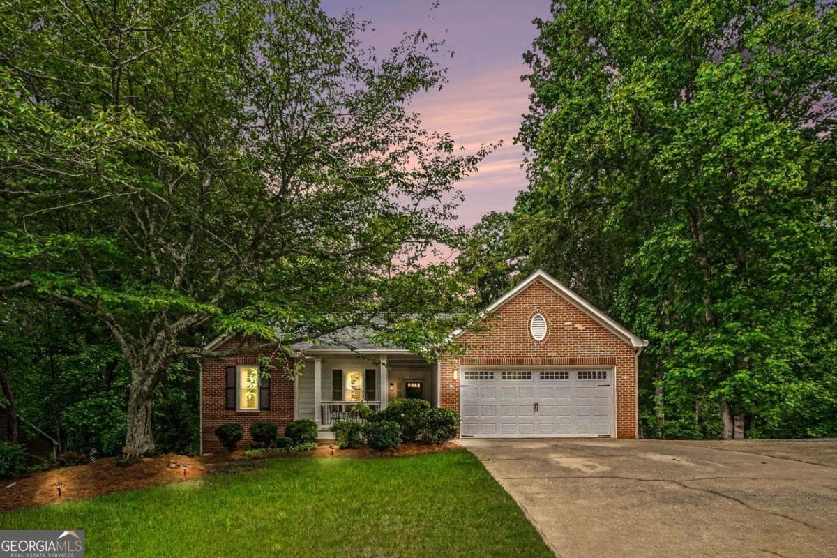 3 bedroom, 2 bathroom, 2,876 sq ft single family residence sold at 6008 Woodcreek Drive, Woodstock, GA 30188