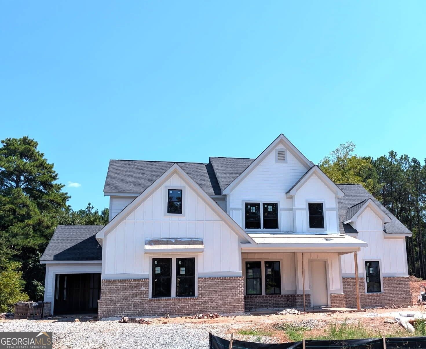 5 bedroom, 4.5 bathroom, 3,679 sq ft single family residence for sale at 4570 Greyson Manor Drive, Cumming, GA 30041 — photo 1 of 12