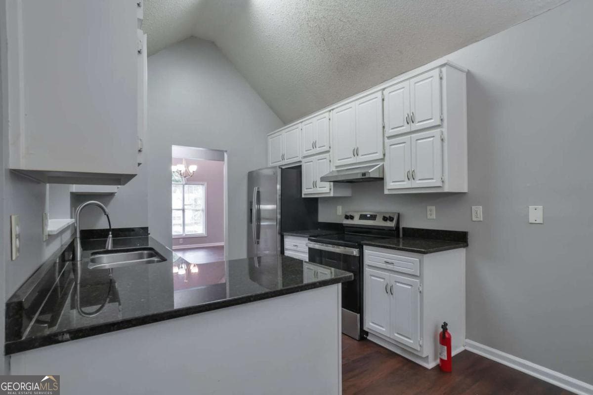 4 bedroom, 3 bathroom, 1,774 sq ft single family residence for sale at 4374 Northridge Trail, Ellenwood, GA 30294 — photo 6