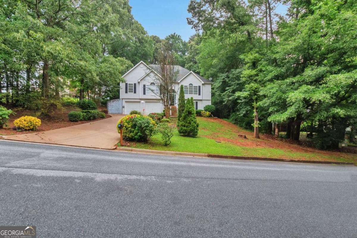 4 bedroom, 3 bathroom, 1,774 sq ft single family residence for sale at 4374 Northridge Trail, Ellenwood, GA 30294 — photo 1 of 30