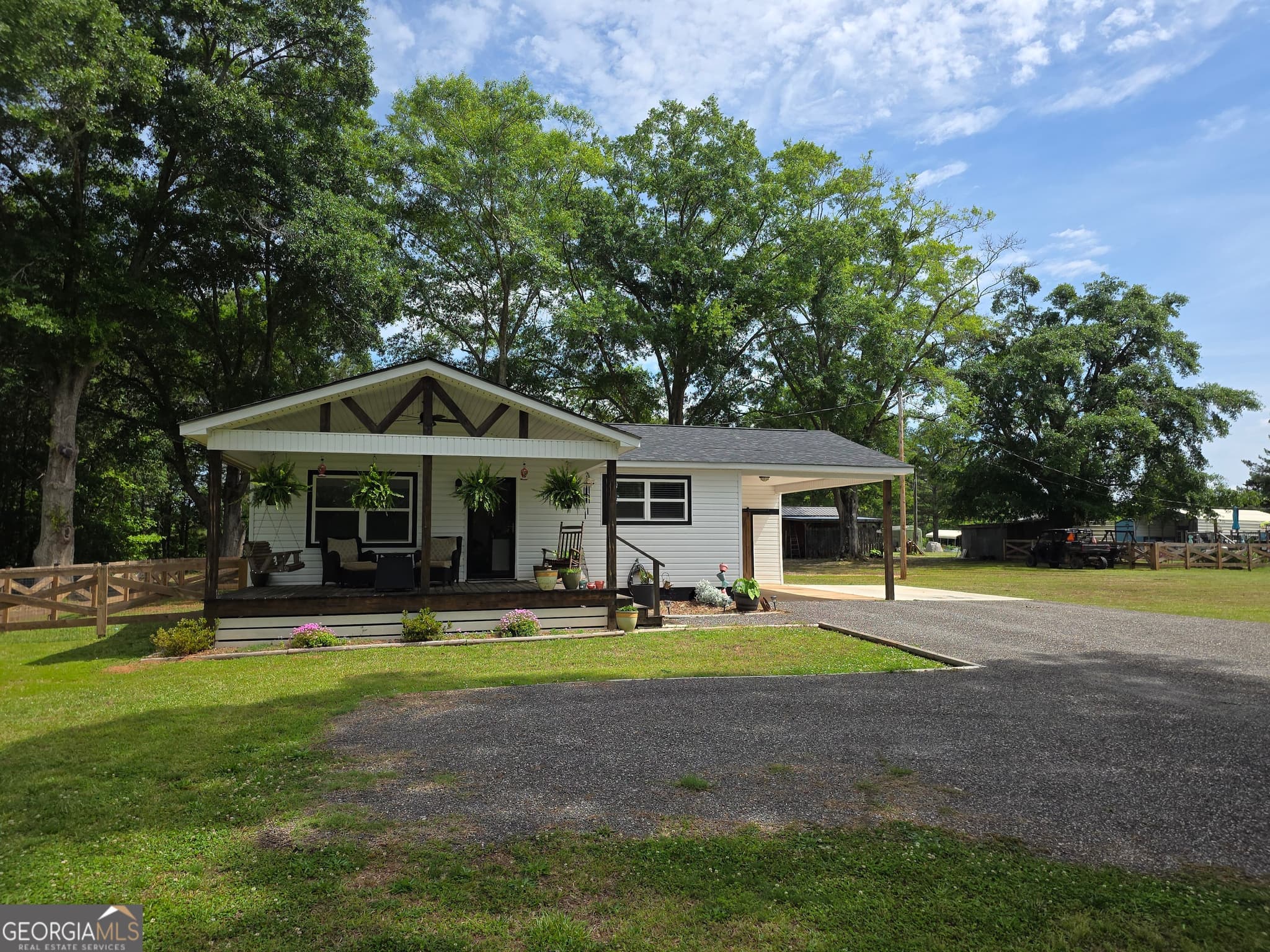 6 bedroom, 3 bathroom, 2,711 sq ft manufactured home,single family residence for sale at 395 E Milner Road, Zebulon, GA 30295 — photo 2