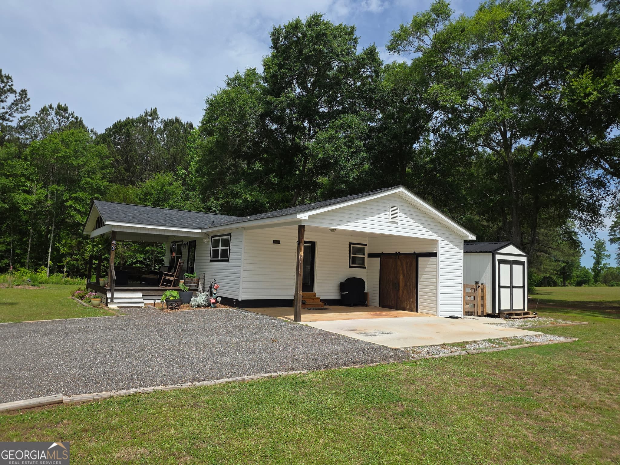 6 bedroom, 3 bathroom, 2,711 sq ft manufactured home,single family residence for sale at 395 E Milner Road, Zebulon, GA 30295 — photo 3