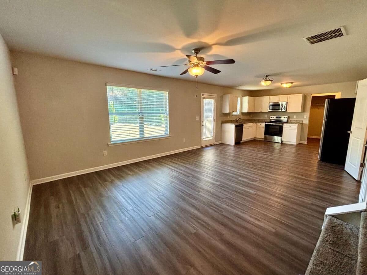 4 bedroom, 2.5 bathroom single family residence for rent at 321 Nutwood Trace, Locust Grove, GA 30248 for $1,950 a month — photo 5