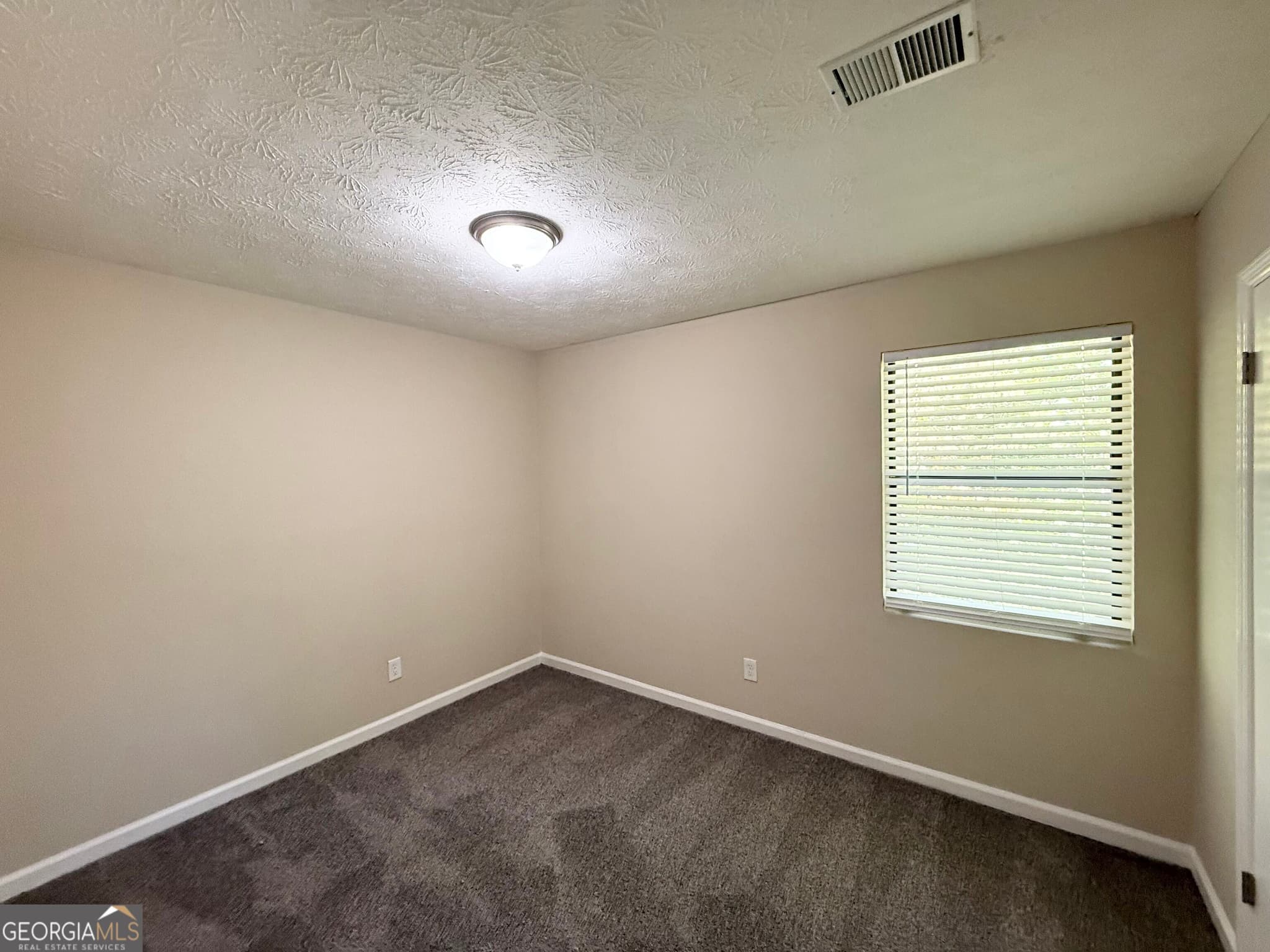 3 bedroom, 2 bathroom, 1,200 sq ft single family residence for sale at 5112 Huxley Road, Stone Mountain, GA 30088 — photo 7