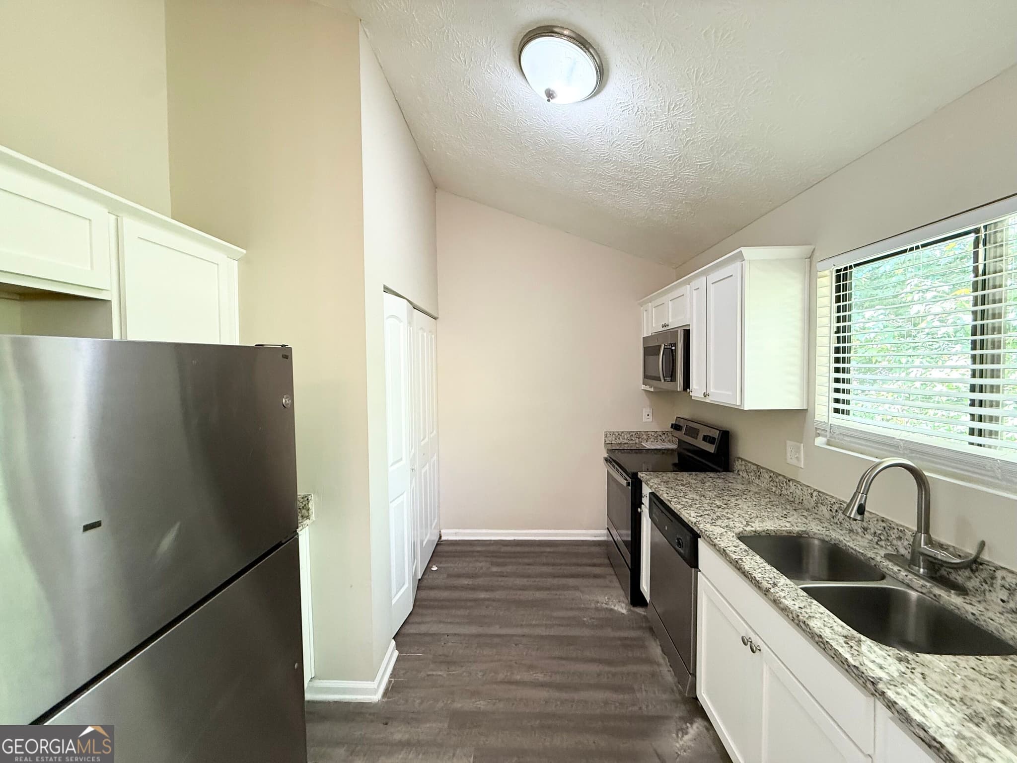 3 bedroom, 2 bathroom, 1,200 sq ft single family residence for sale at 5112 Huxley Road, Stone Mountain, GA 30088 — photo 5
