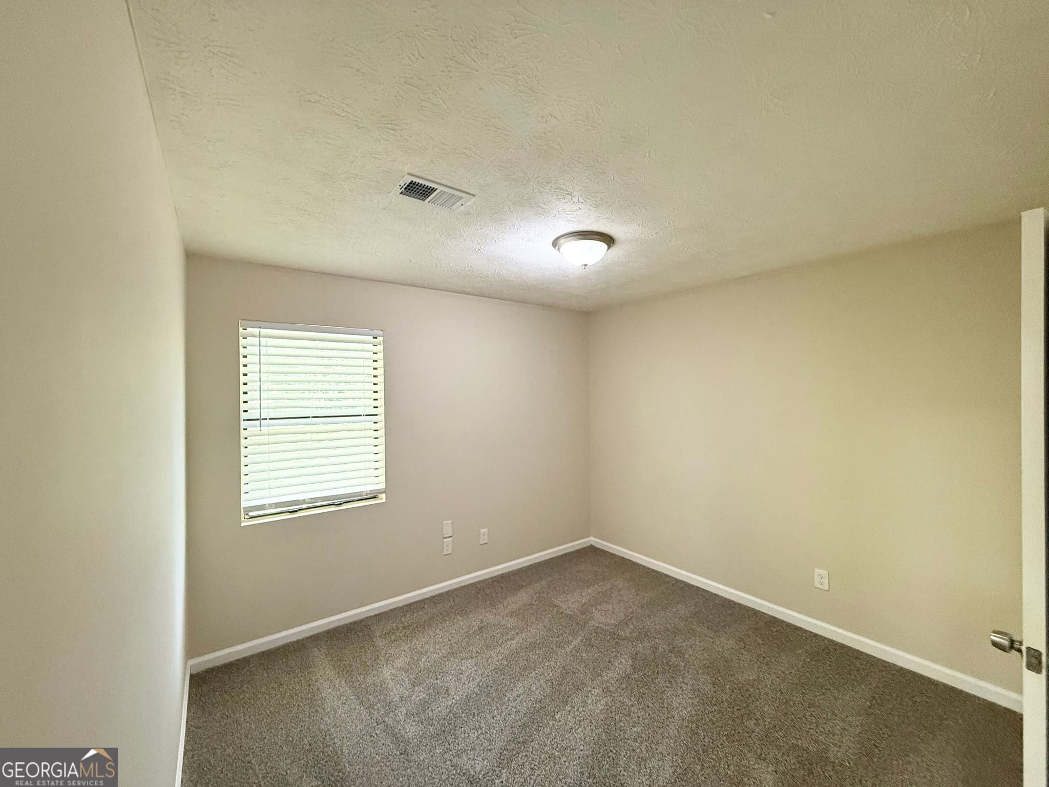 3 bedroom, 2 bathroom, 1,200 sq ft single family residence for sale at 5112 Huxley Road, Stone Mountain, GA 30088 — photo 9