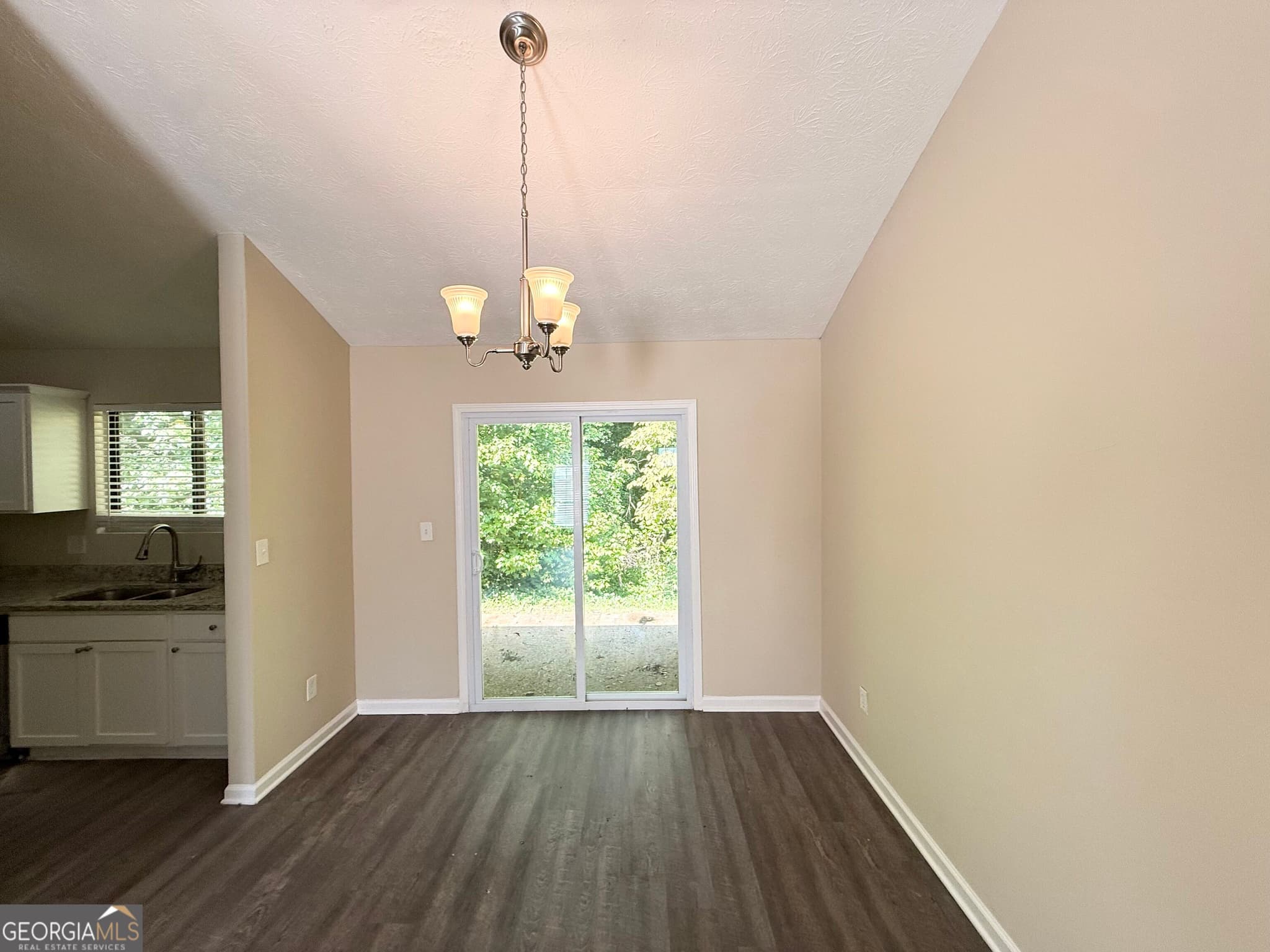 3 bedroom, 2 bathroom, 1,200 sq ft single family residence for sale at 5112 Huxley Road, Stone Mountain, GA 30088 — photo 4