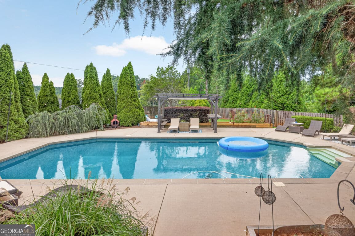 4 bedroom, 3.5 bathroom, 6,831 sq ft single family residence for sale at 5960 Nachoochee Trail, Flowery Branch, GA 30542 — photo 7
