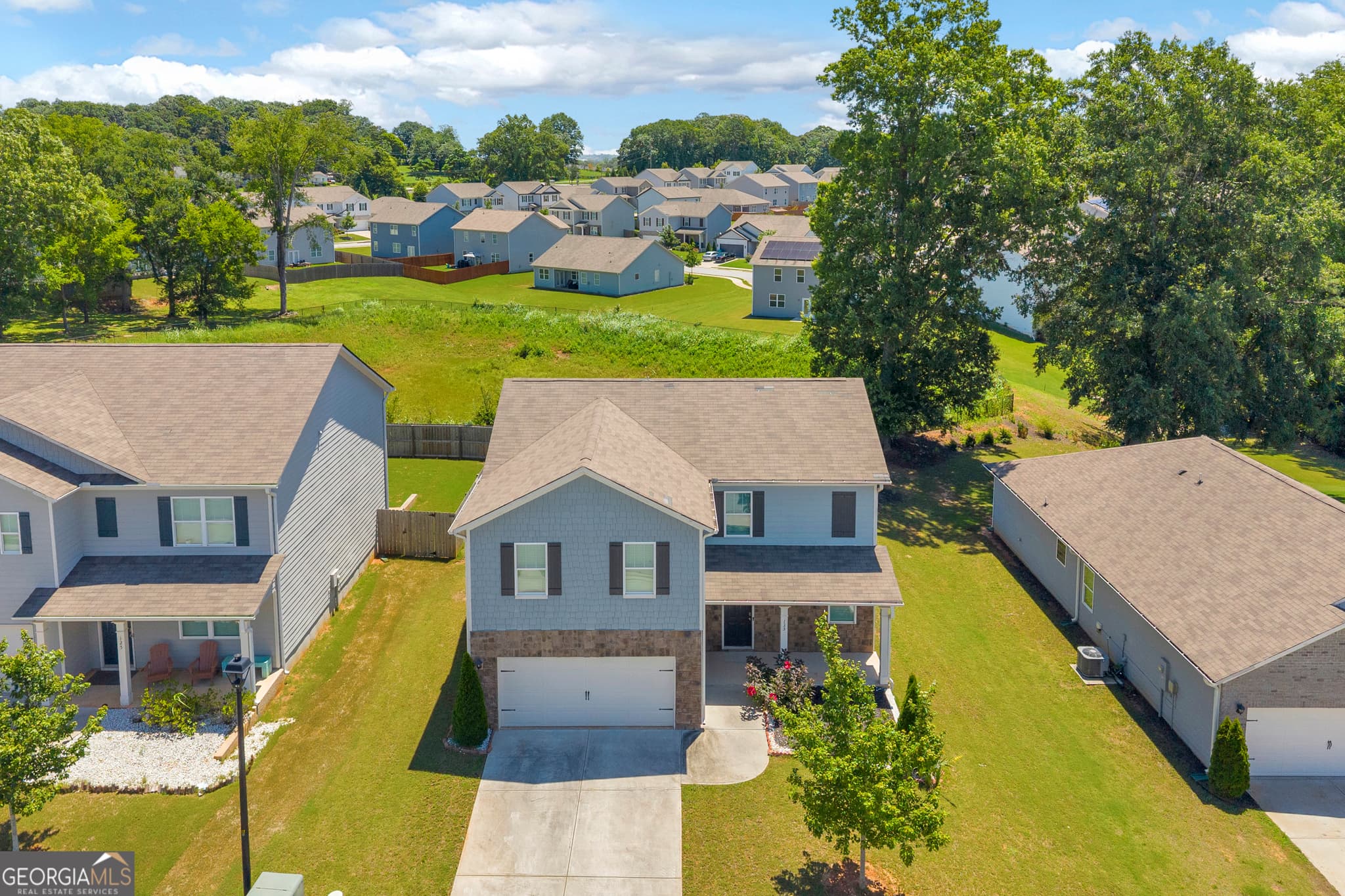4 bedroom, 2.5 bathroom, 2,115 sq ft single family residence for sale at 135 Starbuck Parkway, Pendergrass, GA 30567 — photo 2