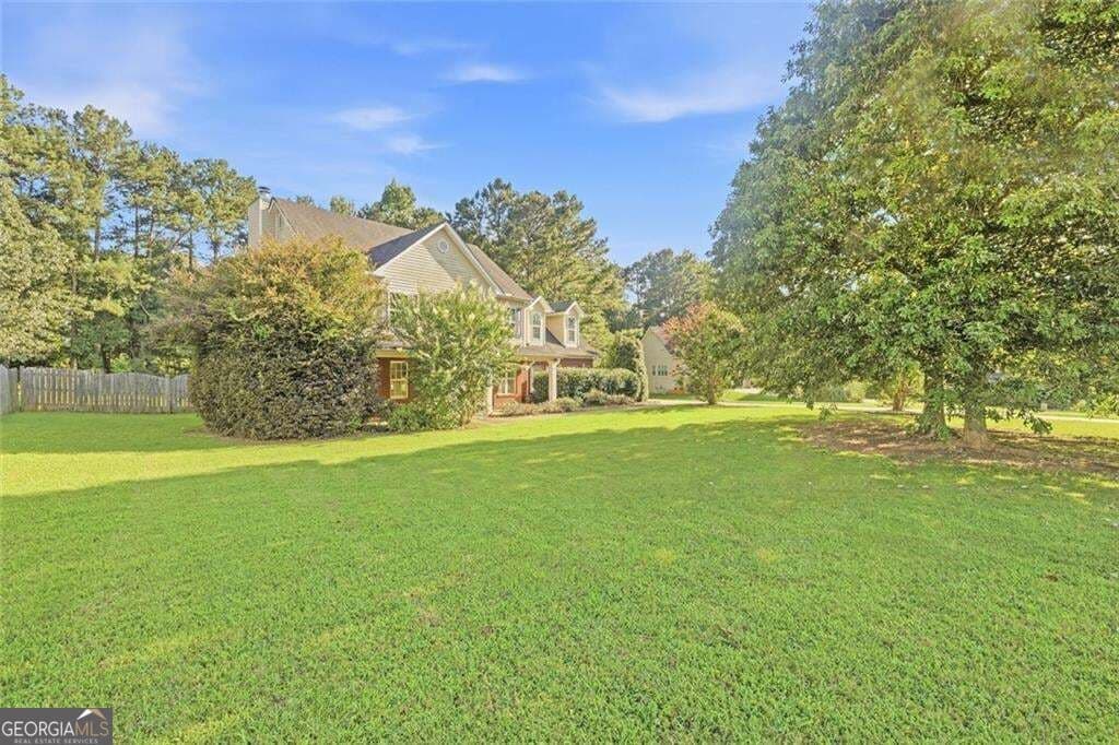 3 bedroom, 2.5 bathroom, 2,285 sq ft single family residence for sale at 169 Nettie Lane, Mcdonough, GA 30252 — photo 2