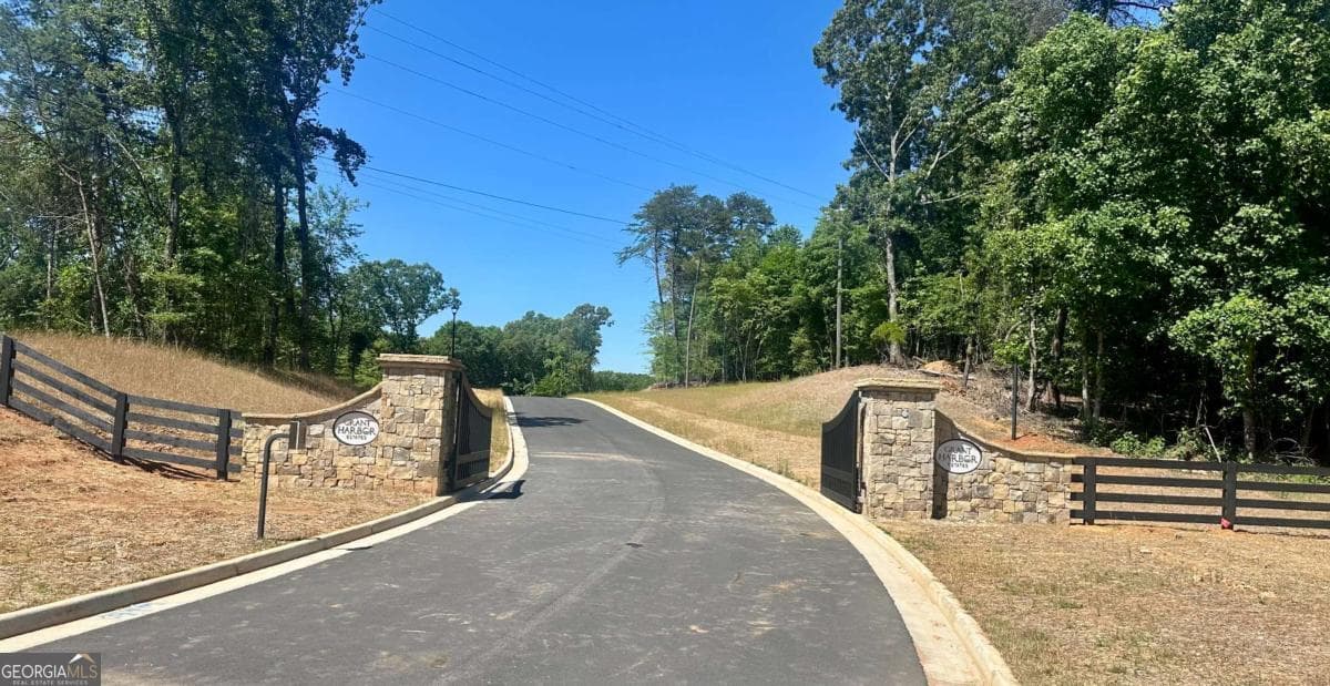 5 bedroom, 5.5 bathroom, 7,096 sq ft single family residence for sale at 6279A Grant Harbor Drive 5, Gainesville, GA 30506 — photo 4