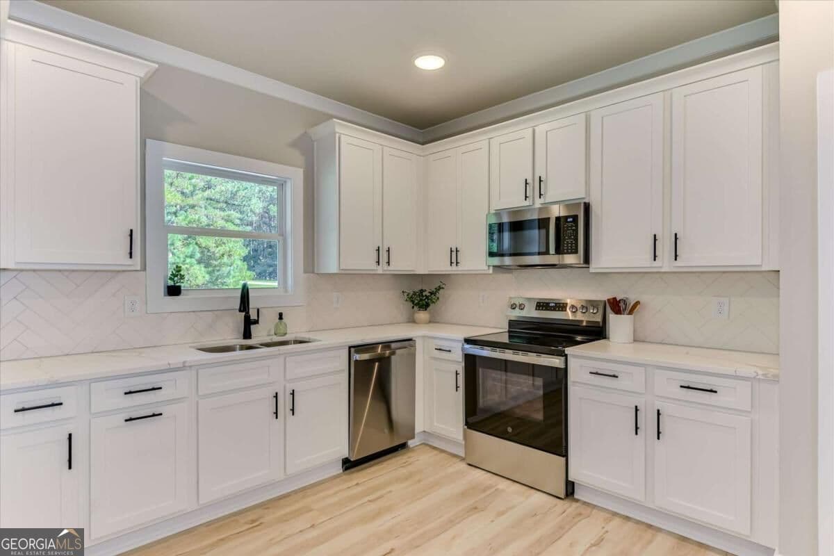 4 bedroom, 3.5 bathroom, 1,611 sq ft single family residence for sale at 1198 Sunset Cove, Tignall, GA 30668 — photo 10