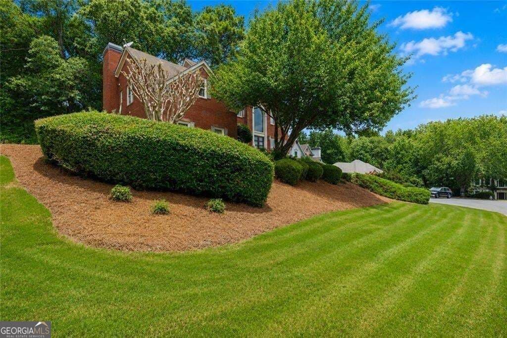 5 bedroom, 5.5 bathroom, 4,445 sq ft single family residence for sale at 600 Sweet Stream Trace, Johns Creek, GA 30097 — photo 5