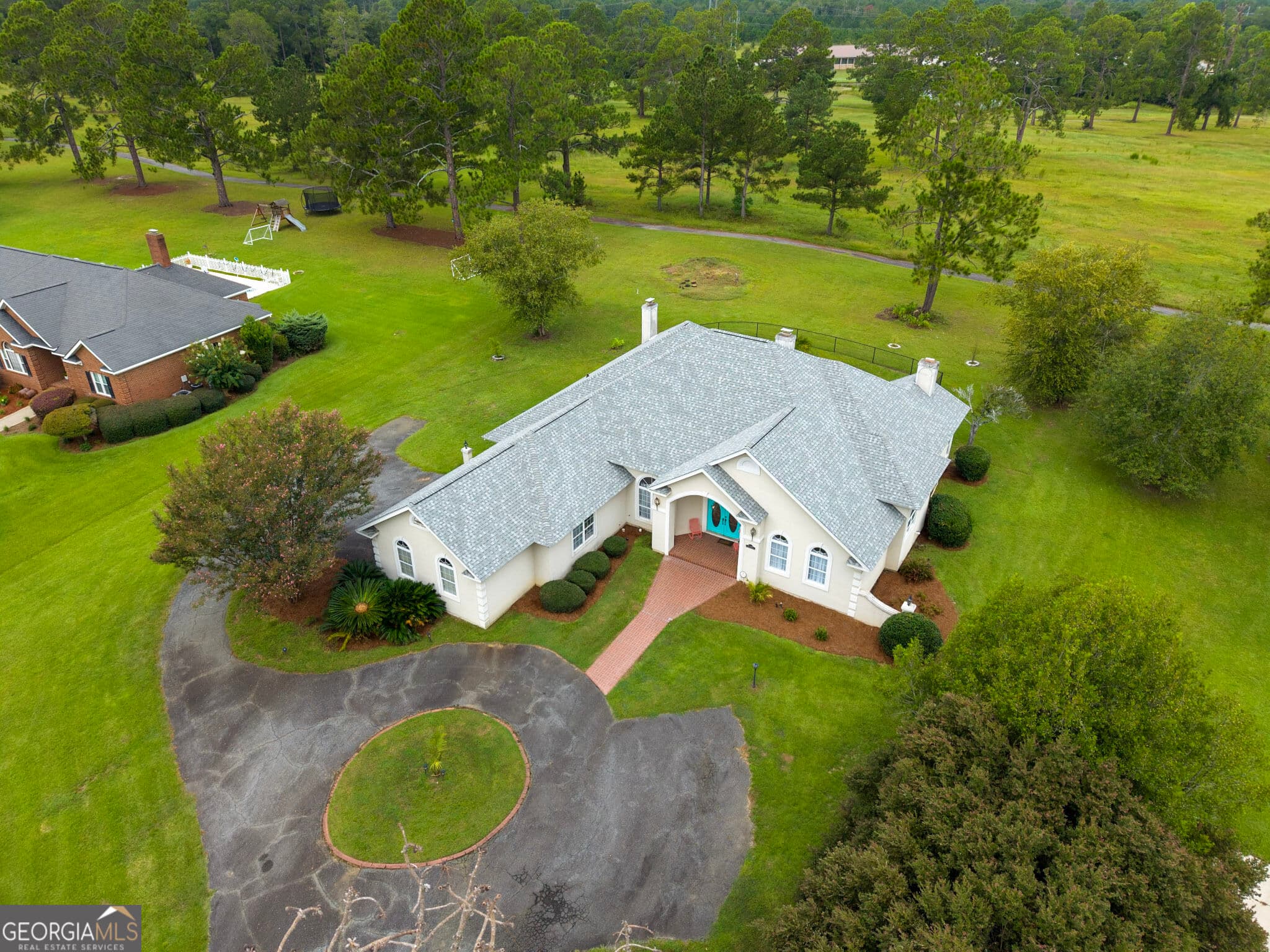 4 bedroom, 3.5 bathroom, 3,052 sq ft single family residence for sale at 1741 Green Acres Drive, Vidalia, GA 30474 — photo 4