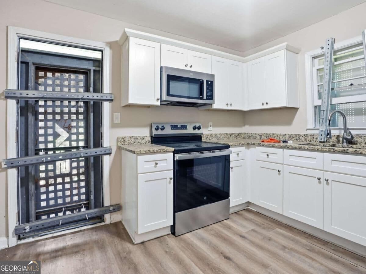 3 bedroom, 2 bathroom, 1,174 sq ft single family residence for sale at 1603 Hollyhock Terrace, Decatur, GA 30032 — photo 7