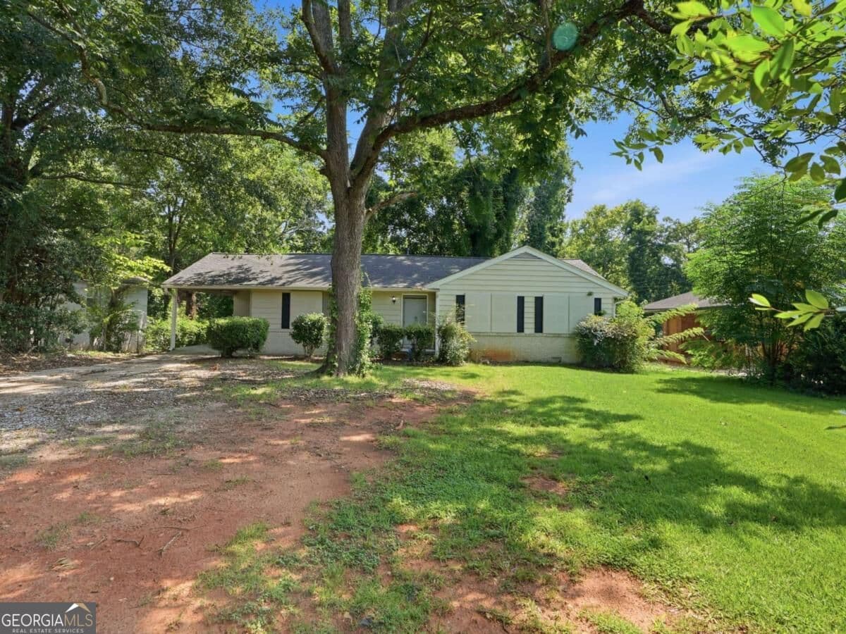 3 bedroom, 2 bathroom, 1,174 sq ft single family residence for sale at 1603 Hollyhock Terrace, Decatur, GA 30032 — photo 1 of 27