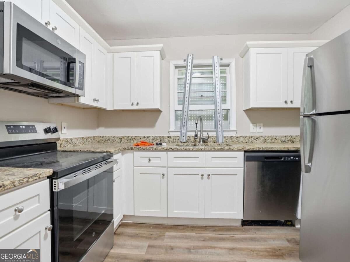 3 bedroom, 2 bathroom, 1,174 sq ft single family residence for sale at 1603 Hollyhock Terrace, Decatur, GA 30032 — photo 9
