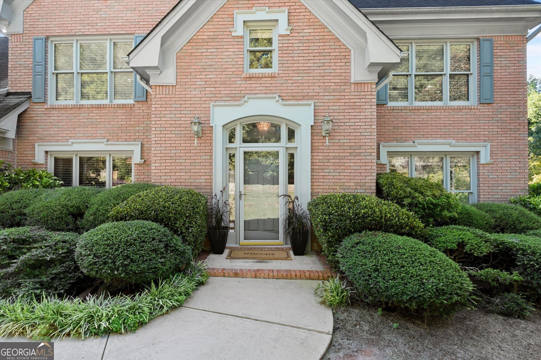5 bedroom, 4 bathroom, 5,448 sq ft single family residence for sale at 3520 Lester Court, Lilburn, GA 30047 — photo 2