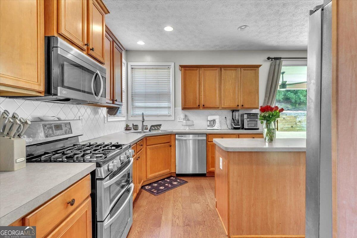 4 bedroom, 2.5 bathroom, 2,924 sq ft single family residence for sale at 3023 Waterdance Drive, Kennesaw, GA 30152 — photo 10