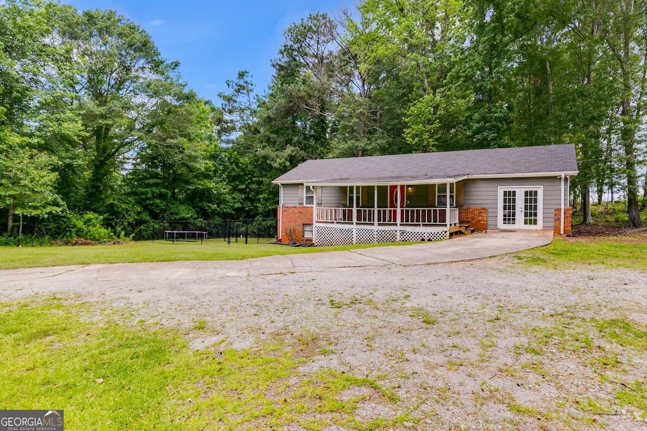 3 bedroom, 1.5 bathroom, 1,752 sq ft single family residence for sale at 2961 W HWY 166, Carrollton, GA 30117 — photo 2