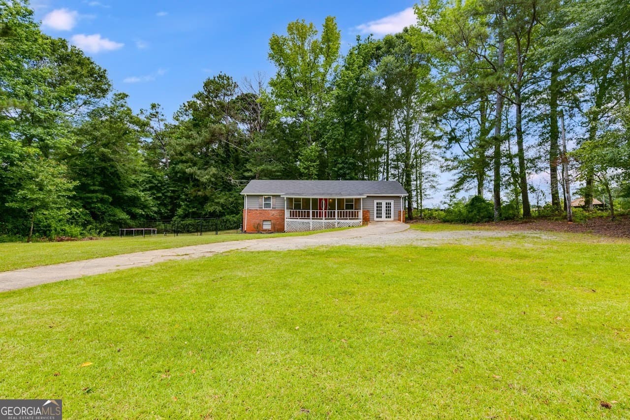3 bedroom, 1.5 bathroom, 1,752 sq ft single family residence for sale at 2961 W HWY 166, Carrollton, GA 30117 — photo 3