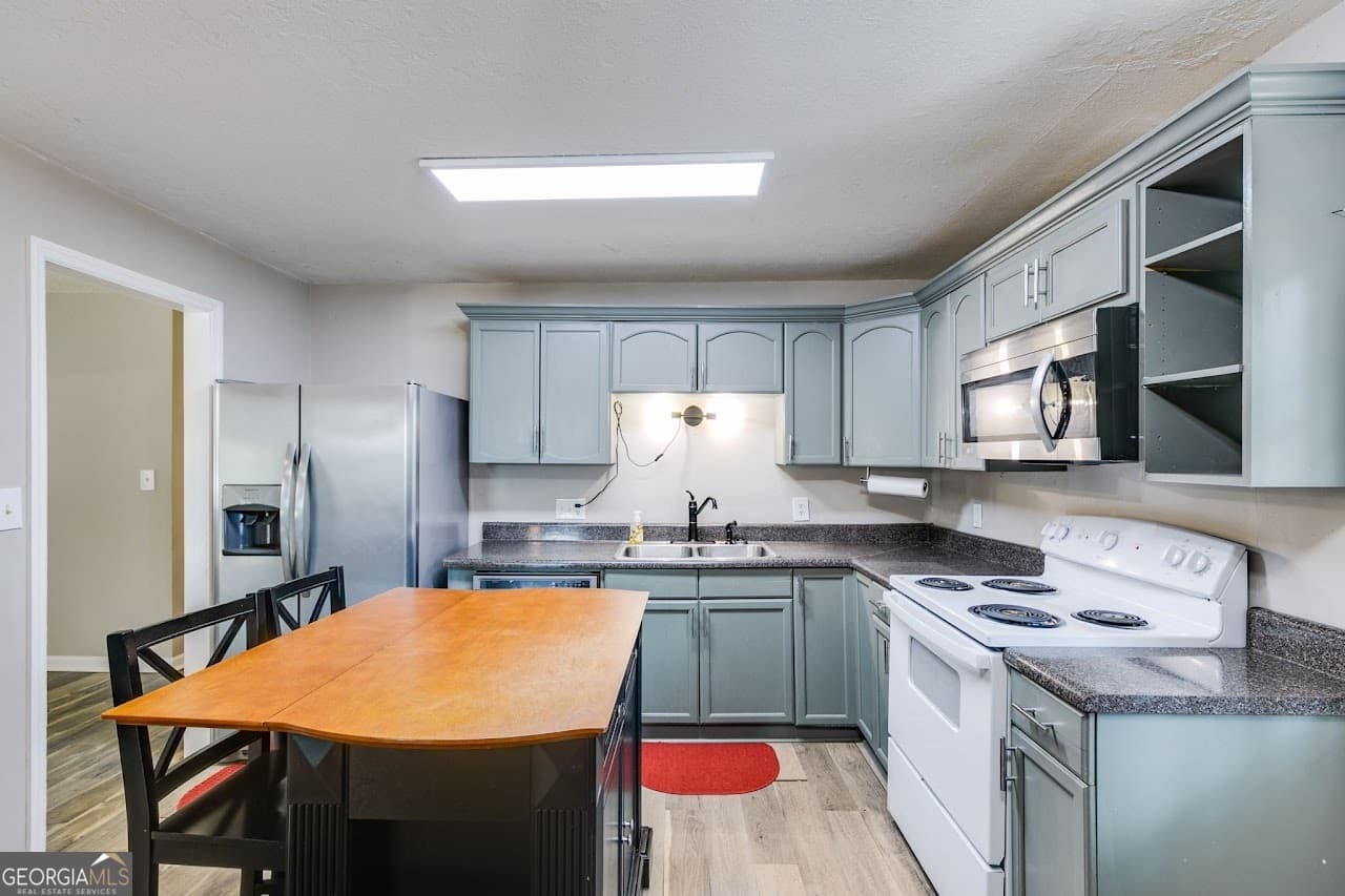 3 bedroom, 1.5 bathroom, 1,752 sq ft single family residence for sale at 2961 W HWY 166, Carrollton, GA 30117 — photo 9