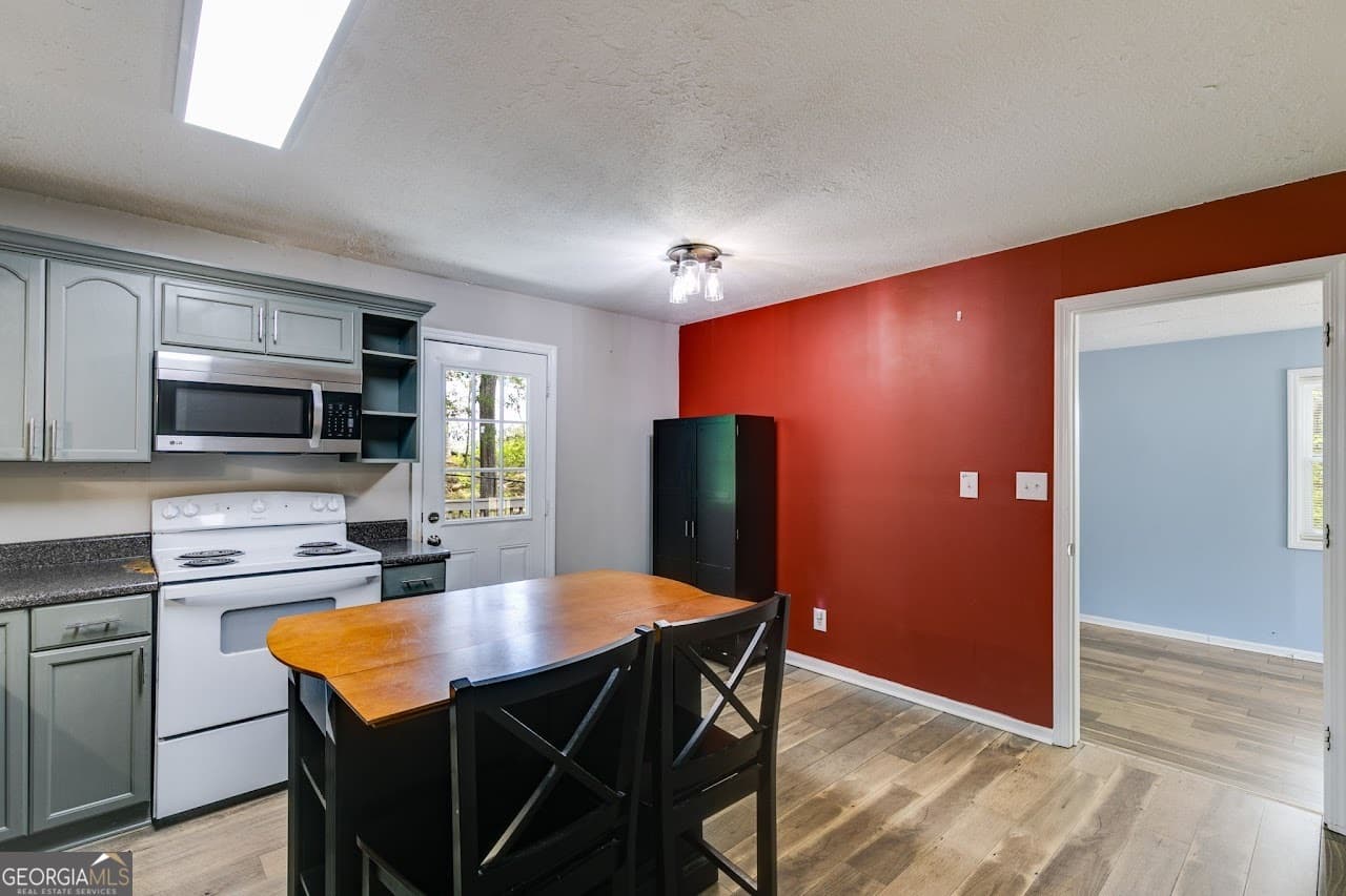 3 bedroom, 1.5 bathroom, 1,752 sq ft single family residence for sale at 2961 W HWY 166, Carrollton, GA 30117 — photo 8
