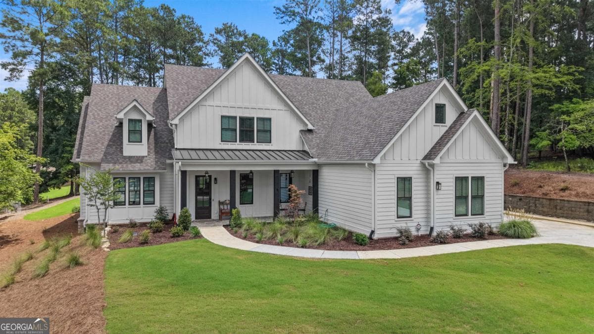 5 bedroom, 4 bathroom, 3,729 sq ft single family residence for sale at 2300 Club Drive, Greensboro, GA 30642 — photo 2