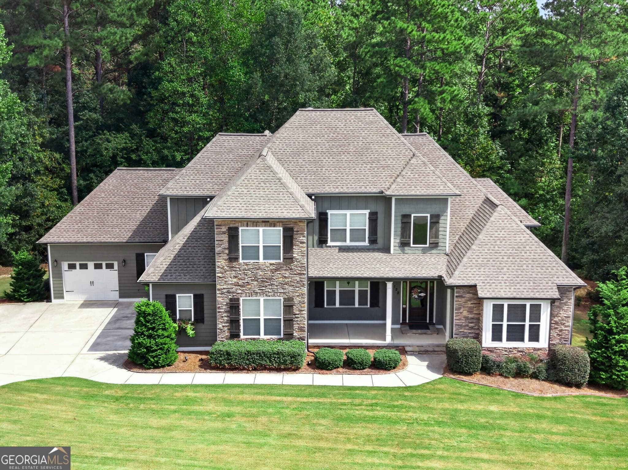 7 bedroom, 5.5 bathroom, 5,198 sq ft single family residence for sale at 122 Brook Trail, Newnan, GA 30265 — photo 4