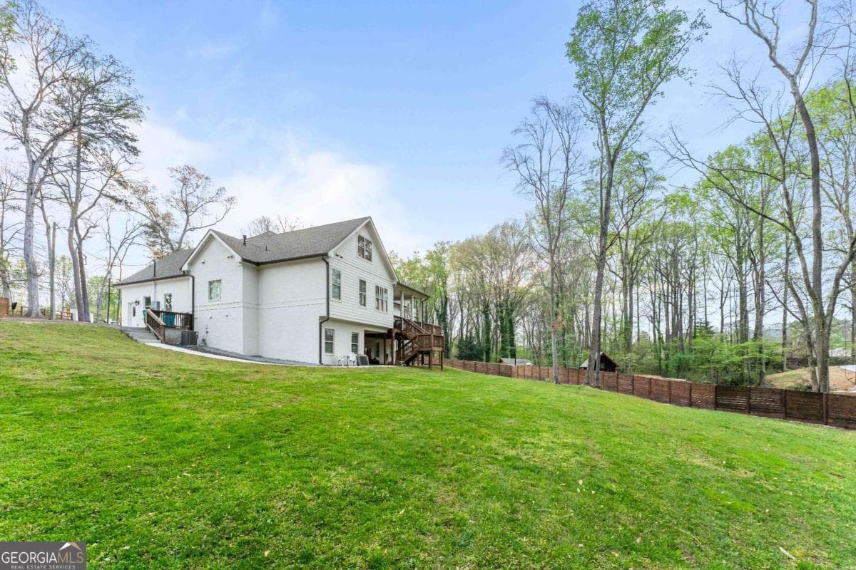 9 bedroom, 7.5 bathroom, 6,638 sq ft single family residence for sale at 5758 Williams Road, Norcross, GA 30093 — photo 9
