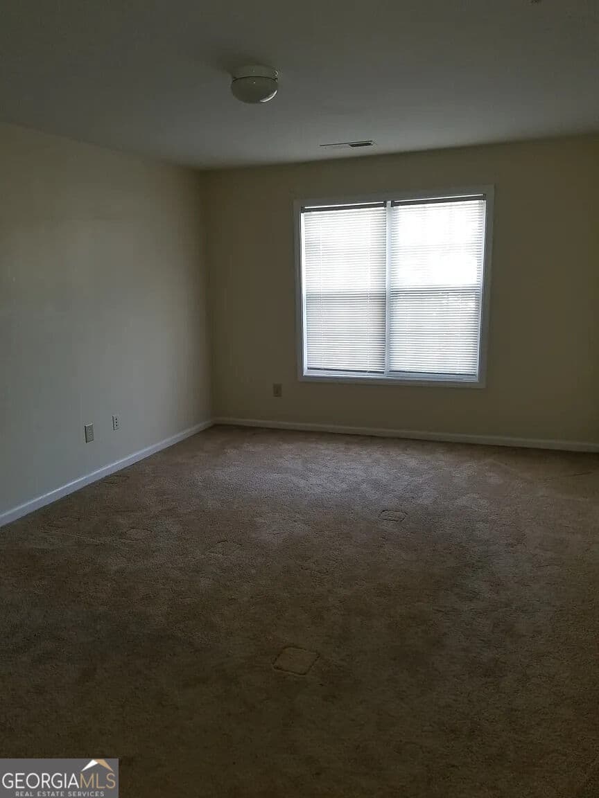 3 bedroom, 2.5 bathroom, 1,418 sq ft townhouse for sale at 7089 Biltmore Trace, Lithonia, GA 30038 — photo 7