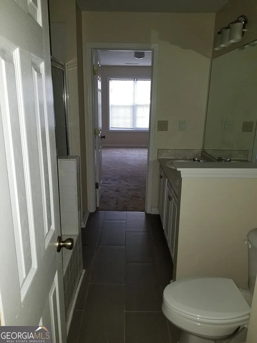 3 bedroom, 2.5 bathroom, 1,418 sq ft townhouse for sale at 7089 Biltmore Trace, Lithonia, GA 30038 — photo 8
