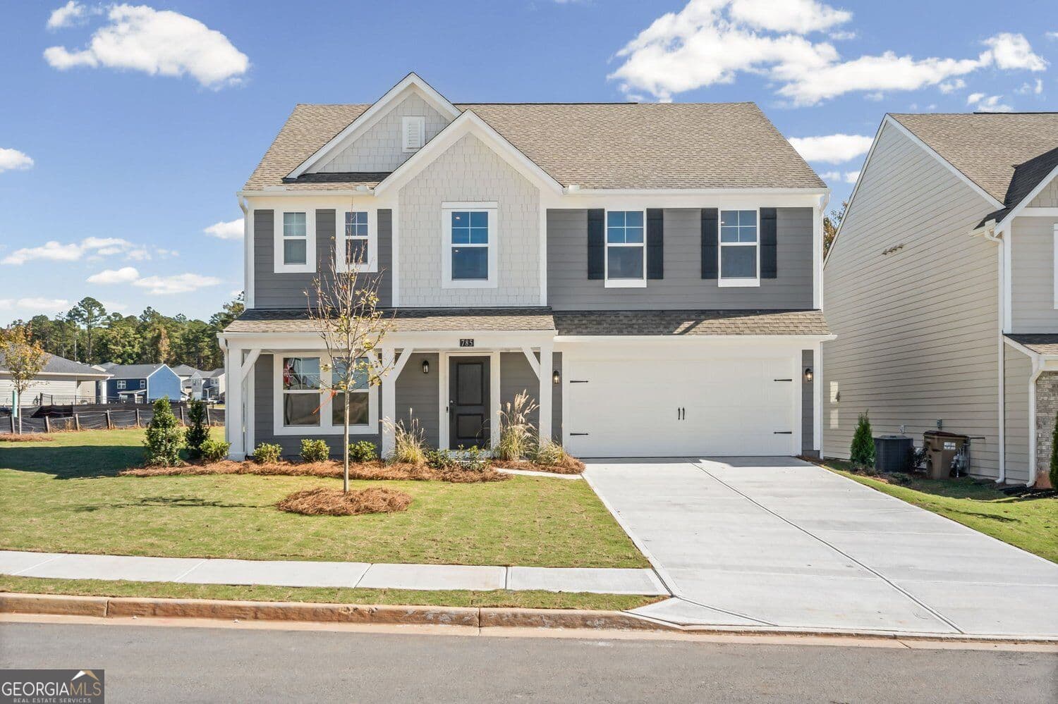 5 bedroom, 3 bathroom, 2,793 sq ft single family residence for sale at 785 Crystal Lake Parkway, Hoschton, GA 30548 — photo 4